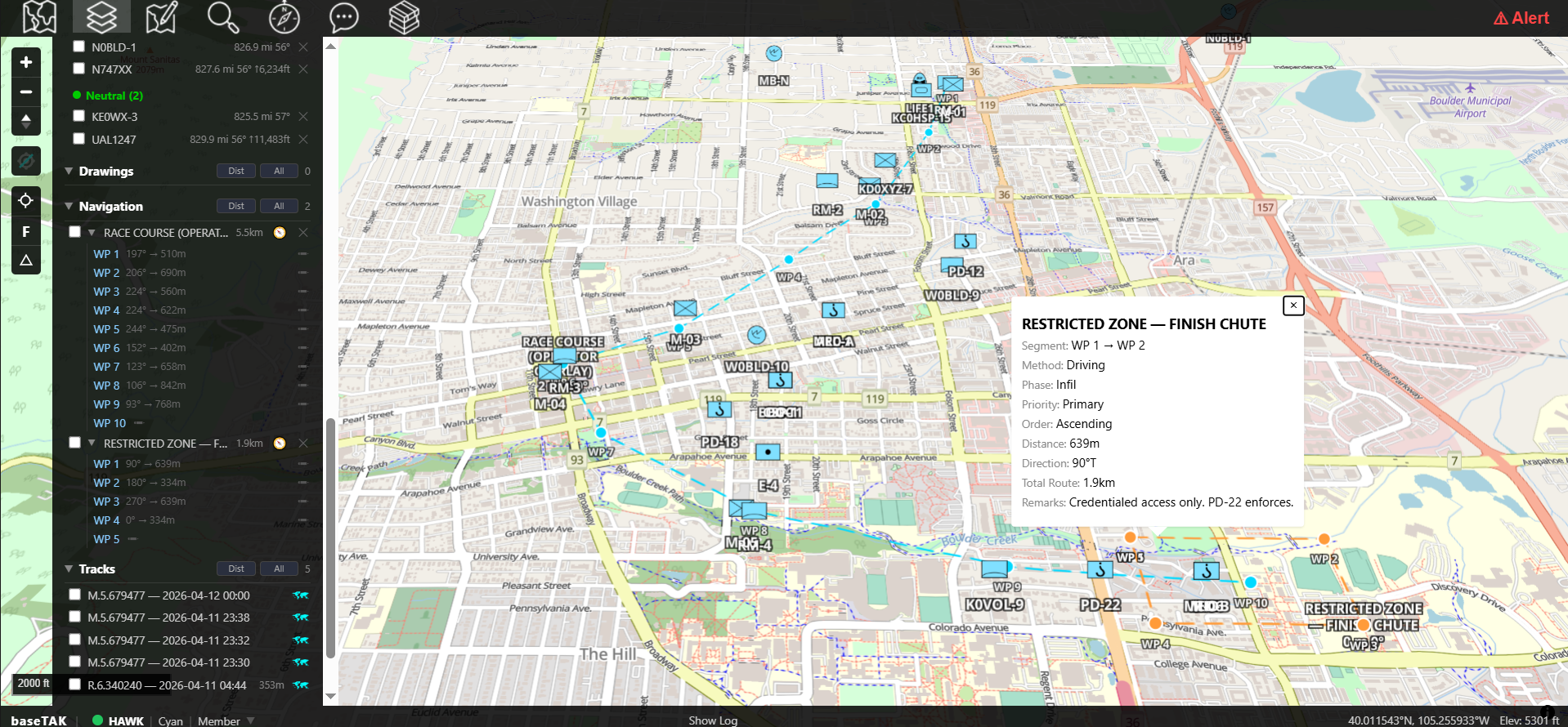 A baseTAK street-map view of a Bolder Boulder 10K race-day operation, the full course traced through downtown with restricted-zone polygons, race-marshal and PD vehicle markers, APRS station beacons, Meshtastic mesh nodes, ADS-B aircraft, and browser-user contacts all visible on a single map, with a callout open for the RESTRICTED ZONE — FINISH CHUTE and a left rail listing Drawings, Navigation, and Tracks
